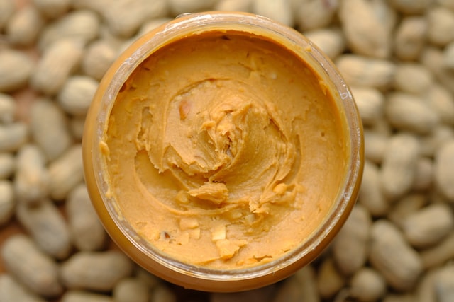 peanut butter is used as a tasty treat to disguise medication for dogs.